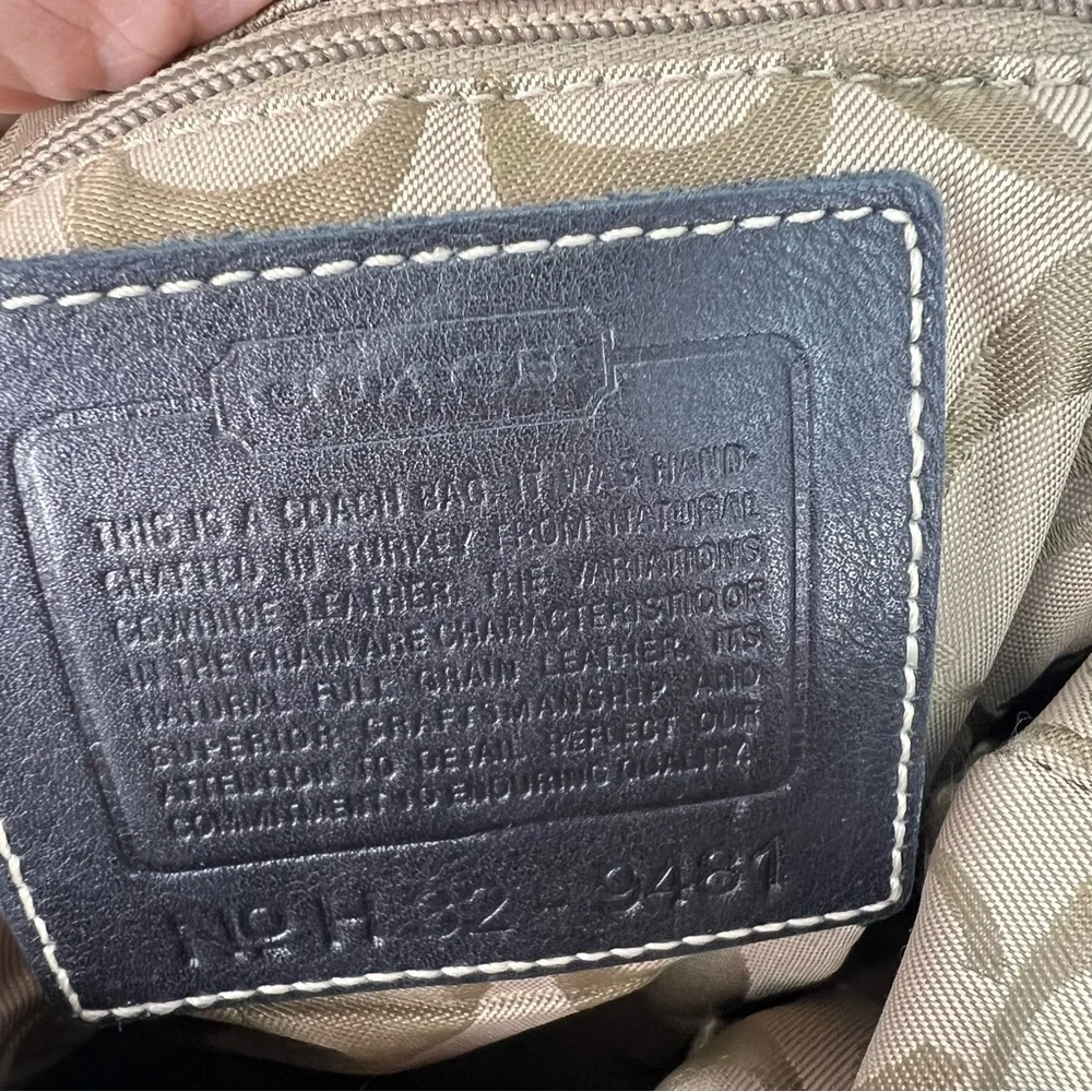 Coach black leather shoulder bag with adjustable strap and silver hardware. - Picture 7 of 11